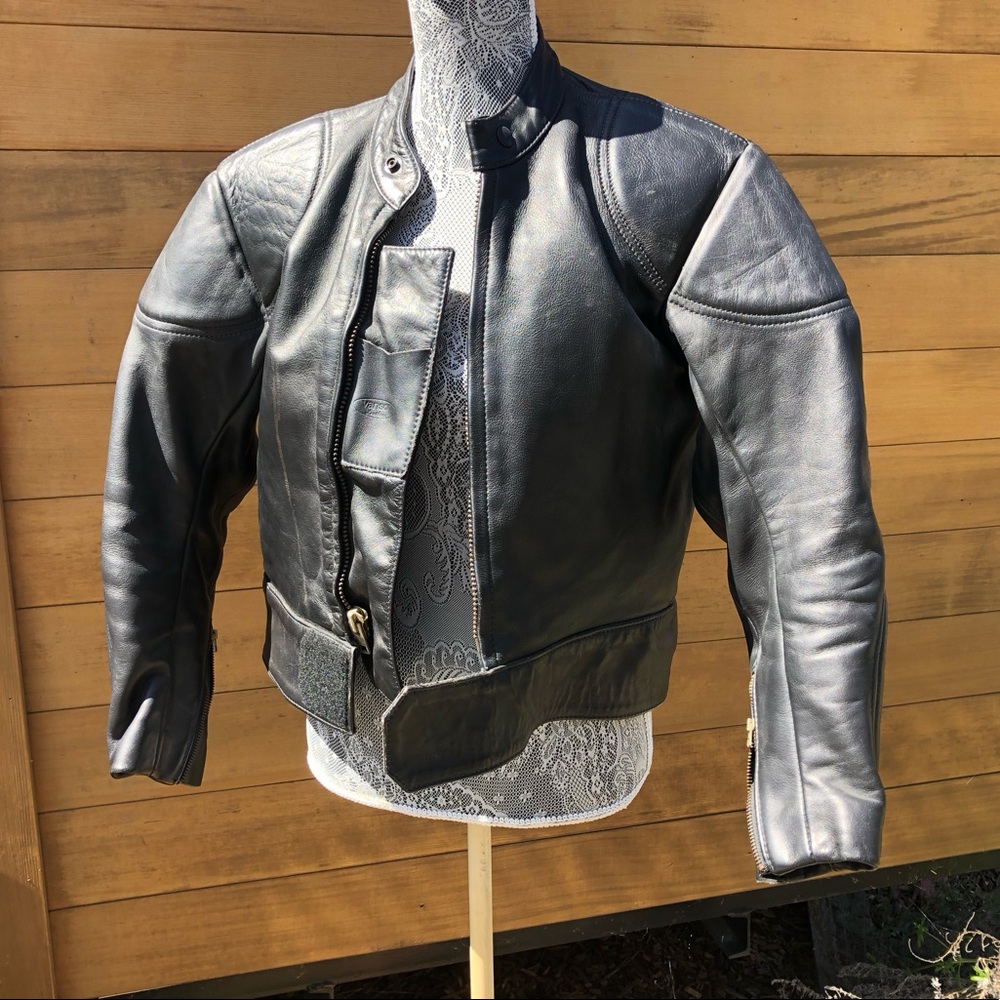 Classic Vanson leather motorcycle jacket with shoulder and elbow/forearm pads.